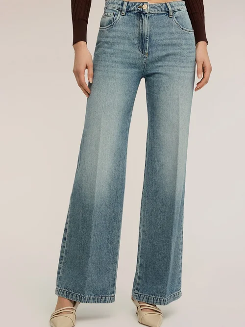 Motivi Blugi evazati cu talie inalta